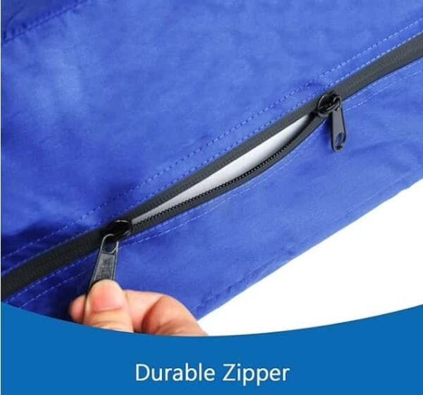 A hand using a durable zipper on a blue fabric
