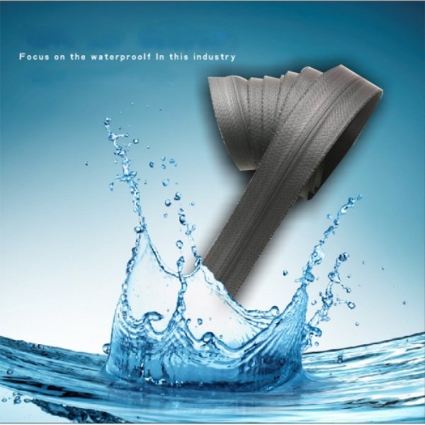 Advertising graphic for airtight and watertight zippers with water splash effect and Chinese - English text about waterproof focus