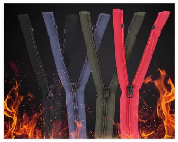 Multiple - colored fireproof nylon zippers set against a fiery background