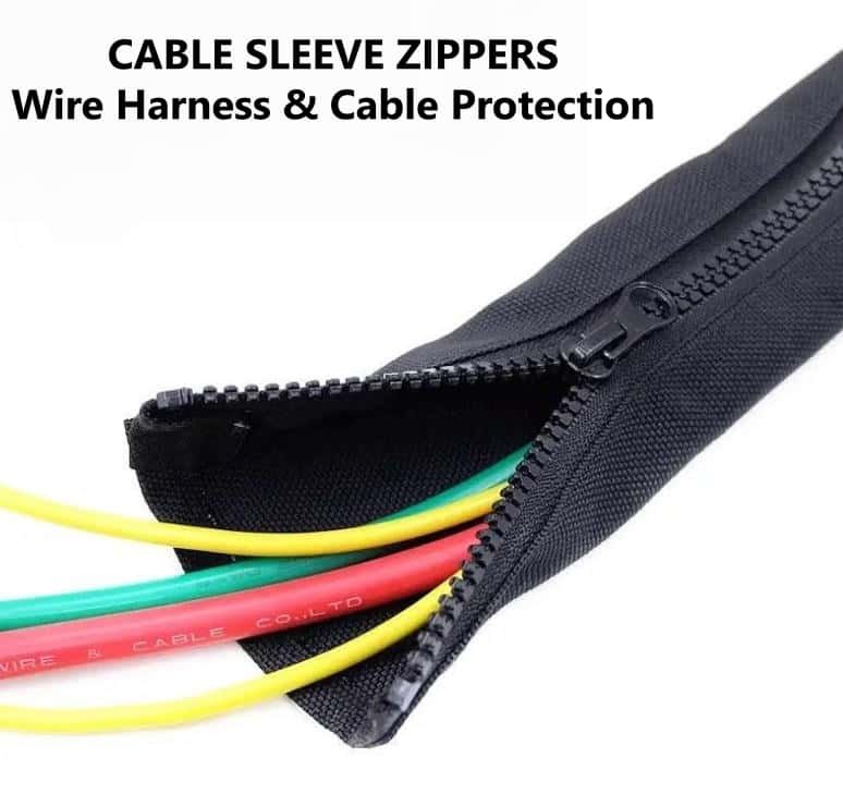 Black cable sleeve zipper for automotive wire harness protection, open zipper exposing multi-color inner electrical wires