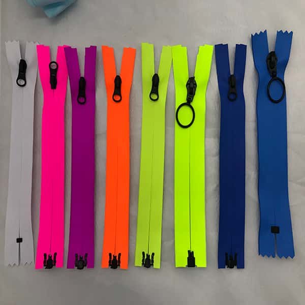 Vibrant multicolor waterproof zippers assortment, custom tape zippers with different pullers for outdoor apparel